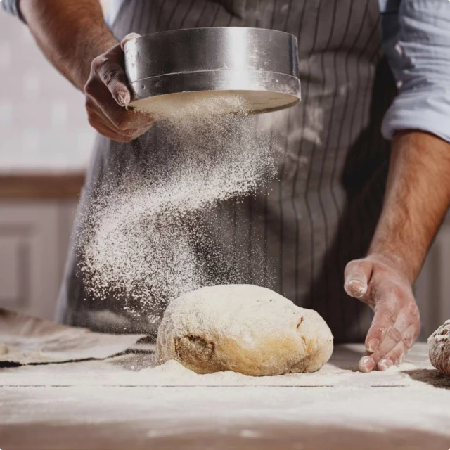 Baker making bread