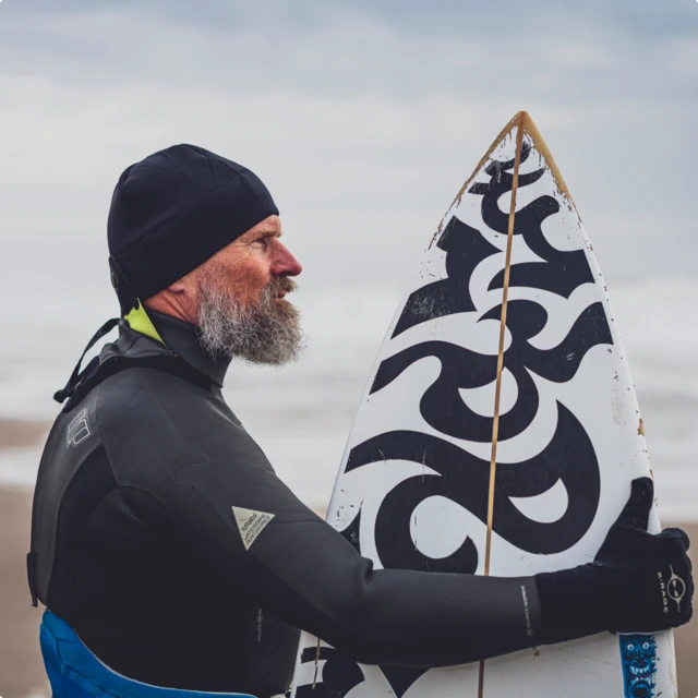 Claus Stig Pedersen with a surfing board