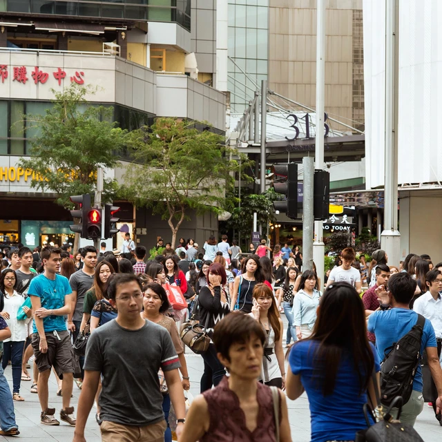 people walking across the street