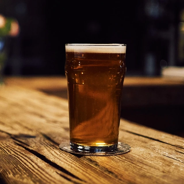 beer-on-wooden-table-in-a-bar