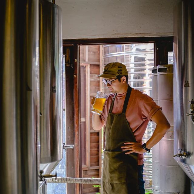 Brewmaster checking beer quality