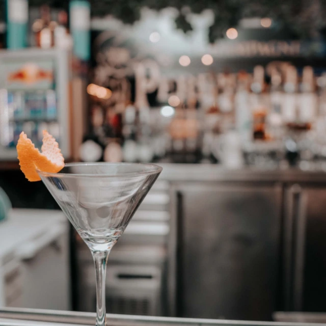 Empty glass on bar counter