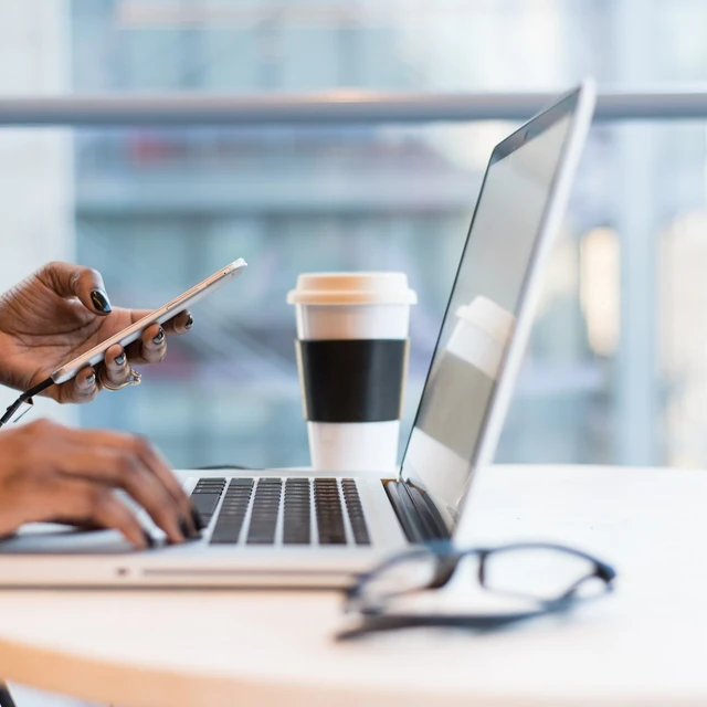 Person having meeting on laptop