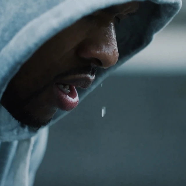 Man exercising and sweating in his clothes