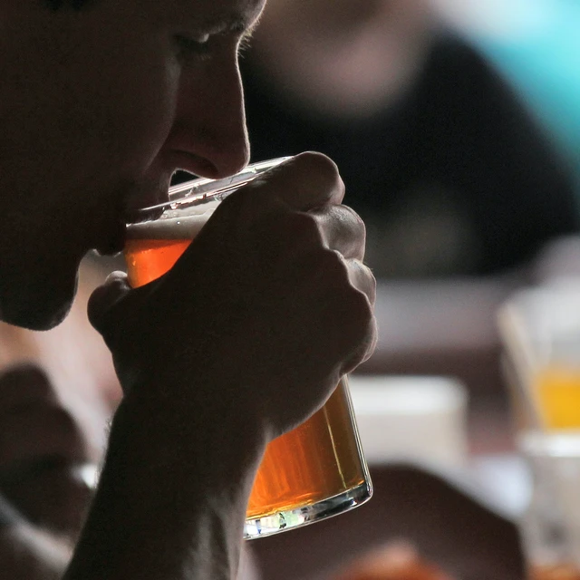 Man tasting his beer