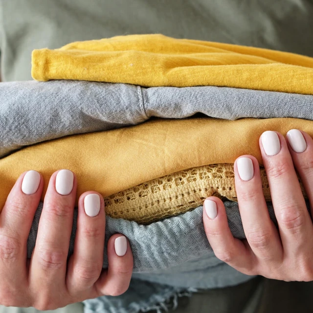 Person holding Laundry