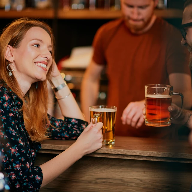 Woman enjoying a beer