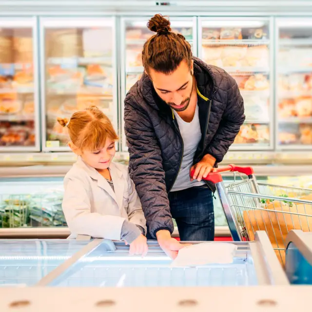 Father and daugther checking ingredients list