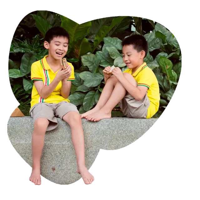 Happy kids enjoying a sandwich