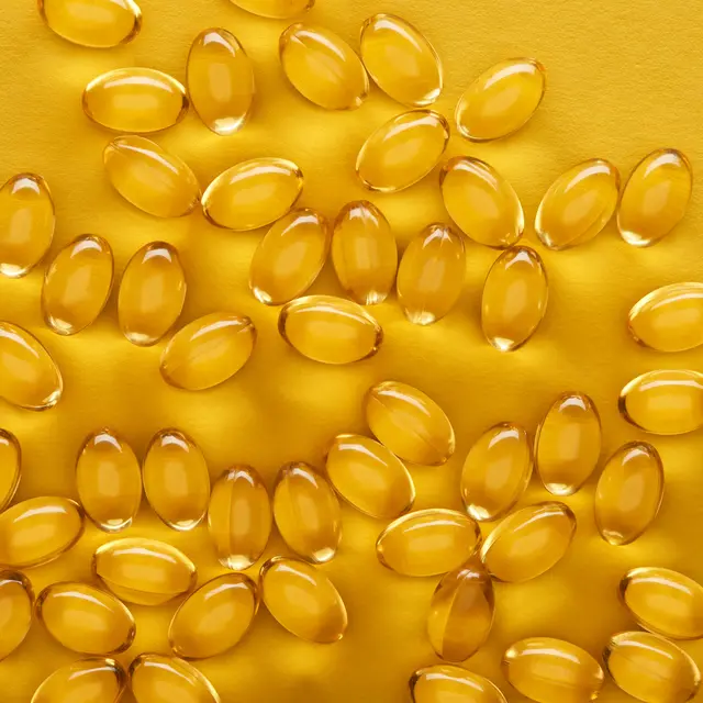 fish oils with yellow background