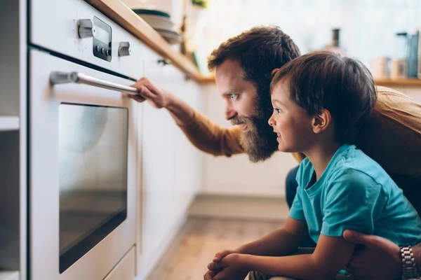 Father and son baking