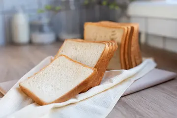 Freshly sliced bread that is soft moist and resilient