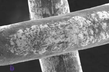 Closeup of stainless steel mesh cleaned with chlorinated compound